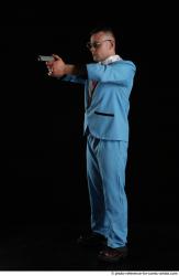 Man Adult Muscular White Fighting with gun Standing poses Business